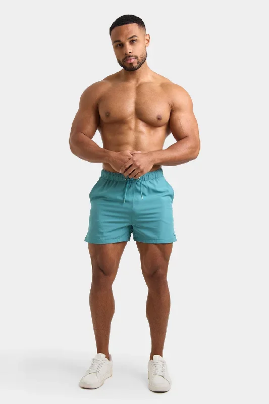 plain-swim-shorts-in-teal